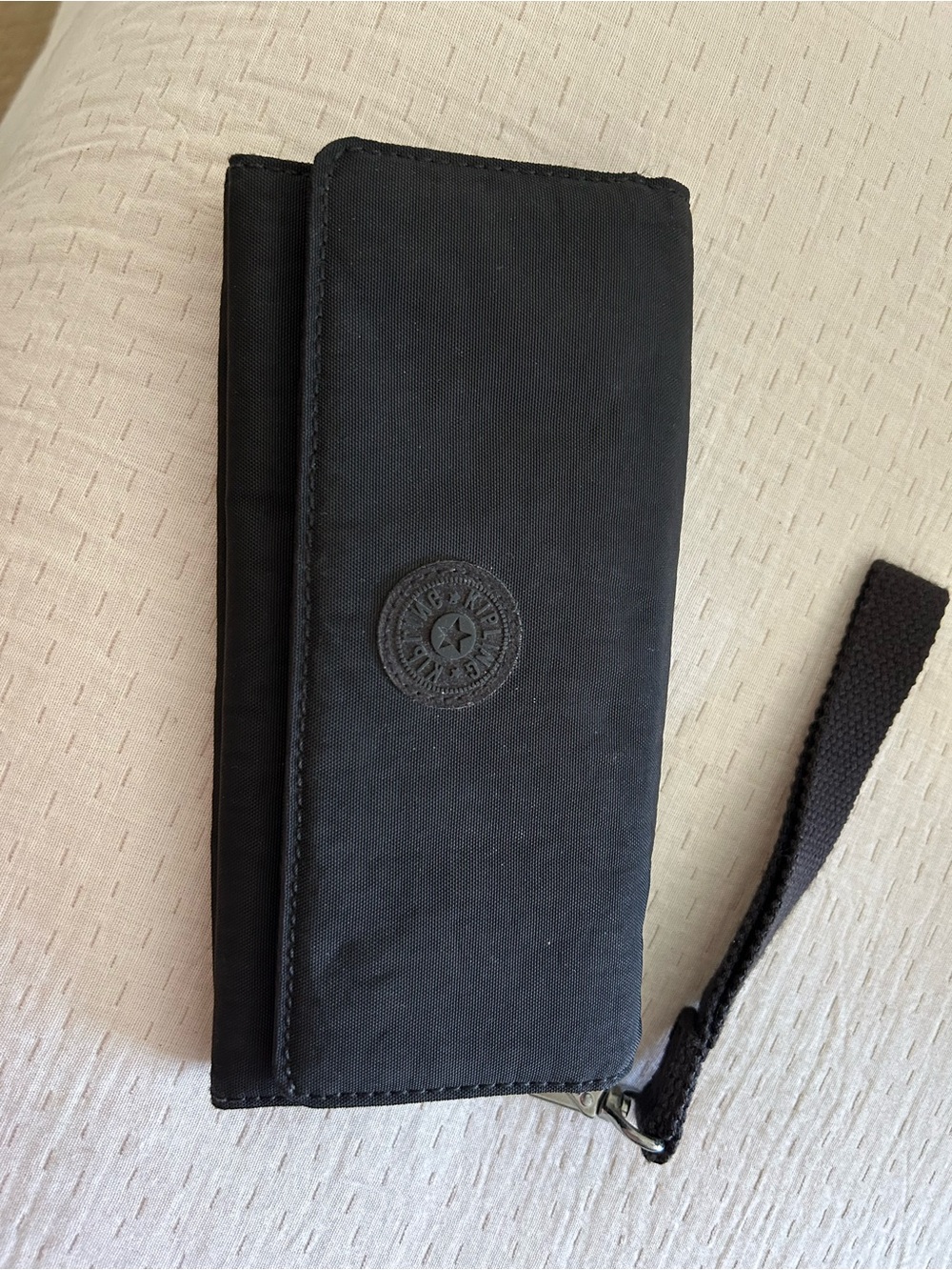 Kipling Black Wristlet Wallet with Embossed Round Logo